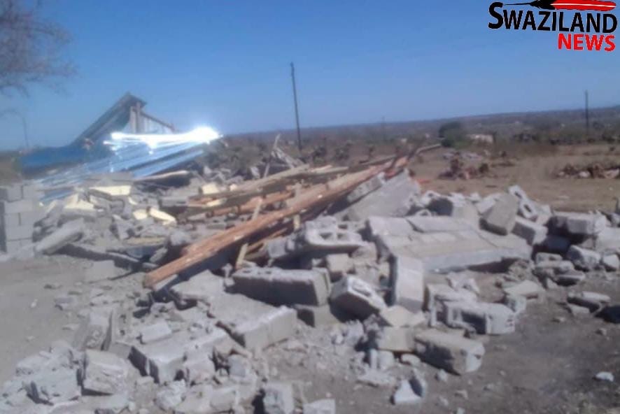 Armed Ngcina Chief Simbambiso Dlamini destroys under construction Shopping Complex owned by late Manzini police officer, says “I was empowered by a court order”.