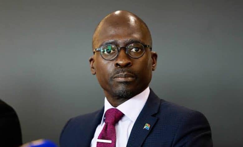 Former Public Enterprise Minister Malusi Gigaba charged with corruption, hands himself over to the police.