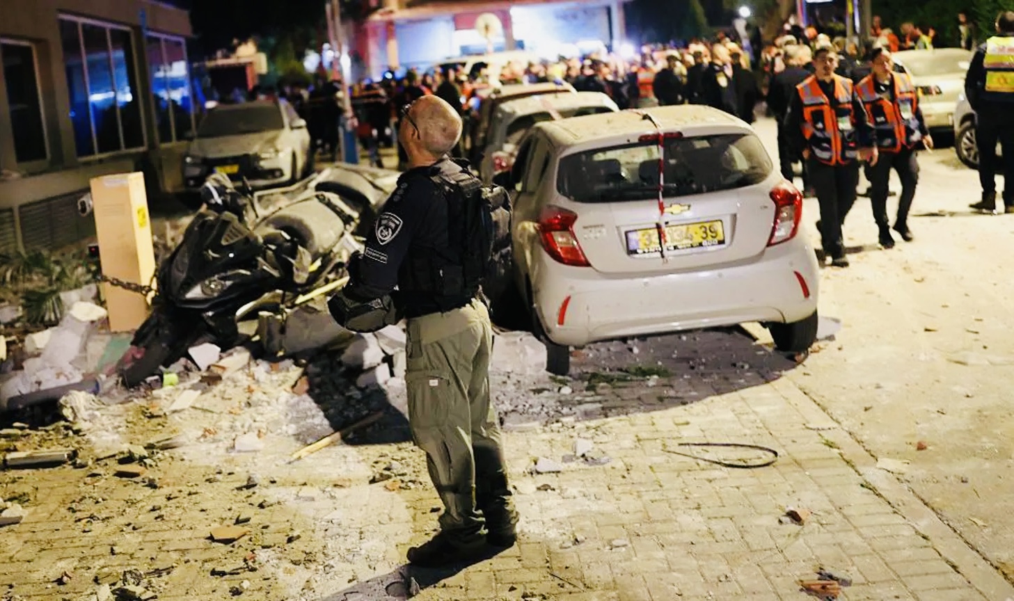 Israel wants Iran to face war crimes after using cluster missiles causing extensive damage.