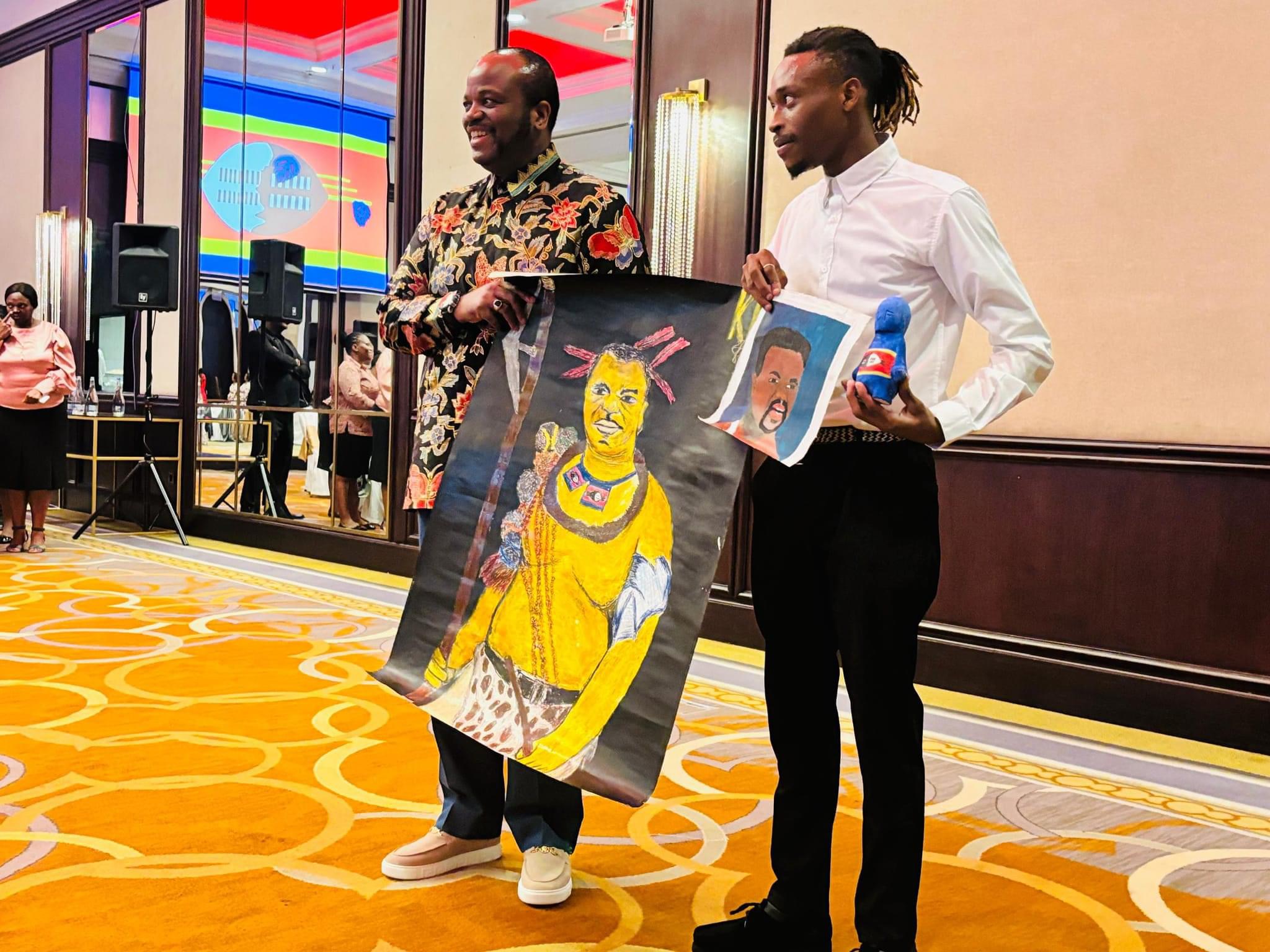 Serbian based University student Sibongakhonkhe Buhlebuyeza Nxumalo presents portraits to King Mswati as an appreciation for good leadership.