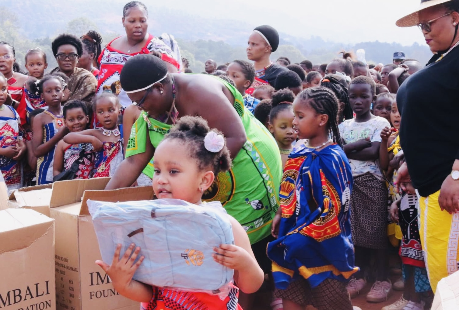 UMHLANGA REED DANCE CEREMONY:Imbali receives school bags and other gifts from King Mswati.
