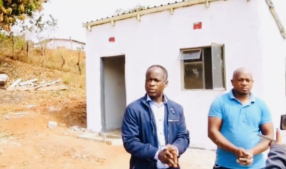 Lobamba MP Michael Masilela hands-over new house to Thulani Dlamini of Gelekeceni whose home was recently destroyed by fire.