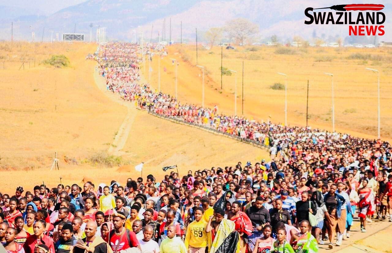 Thousands of Imbali young girls march to ENgabezweni Royal Residence, to be commissioned by King Mswati to cut reed as part of Umhlanga Reed Dance Ceremony.