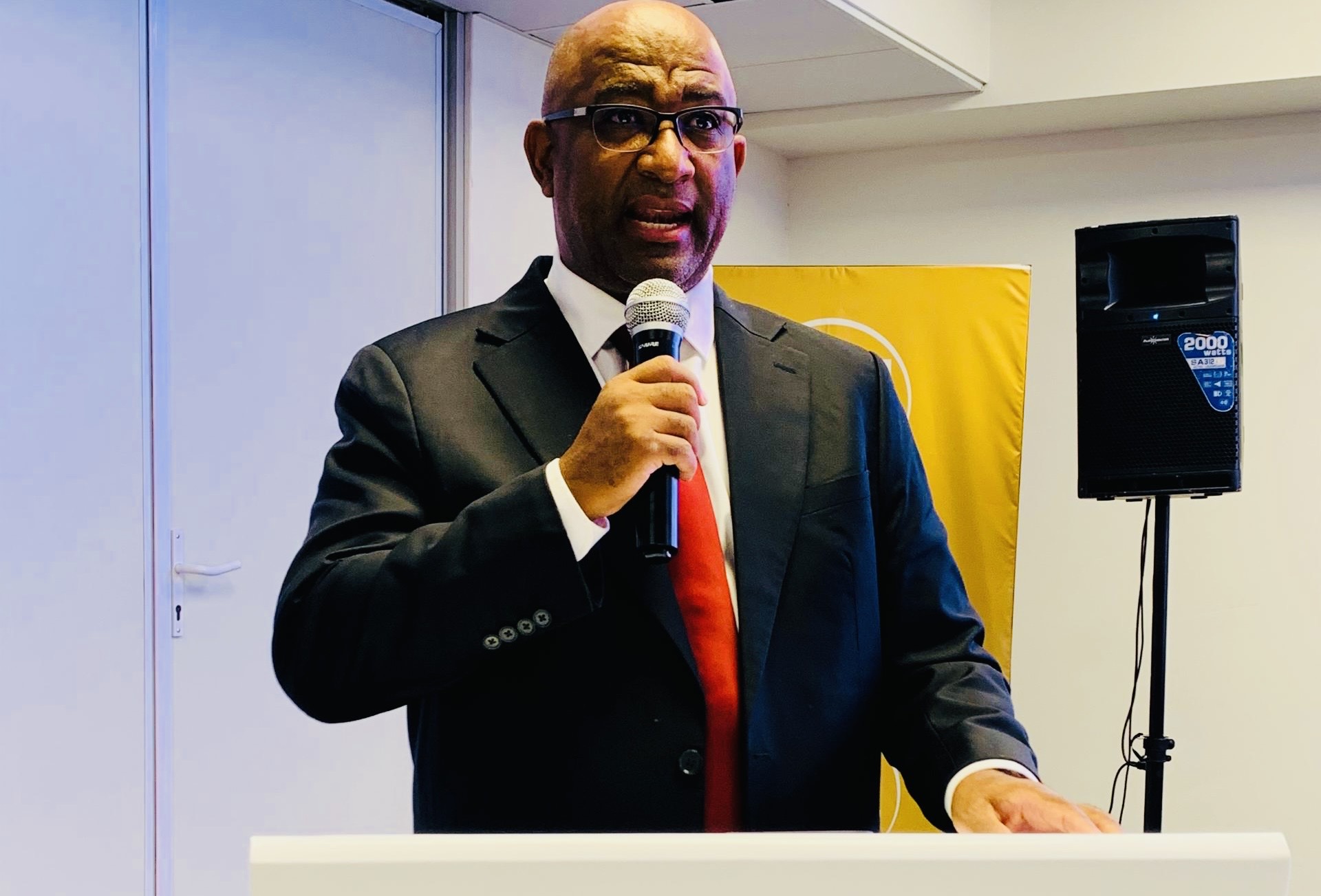 Central Bank Governor Dr. Phil Mnisi urges banks to provide affordable loans and other services, promote financial inclusion.